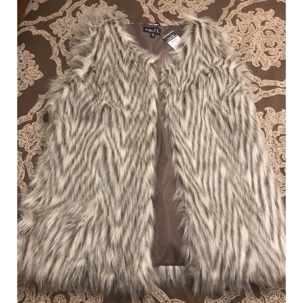 FAUX fur vest.